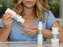 Woman using the Clenziderm MD System.